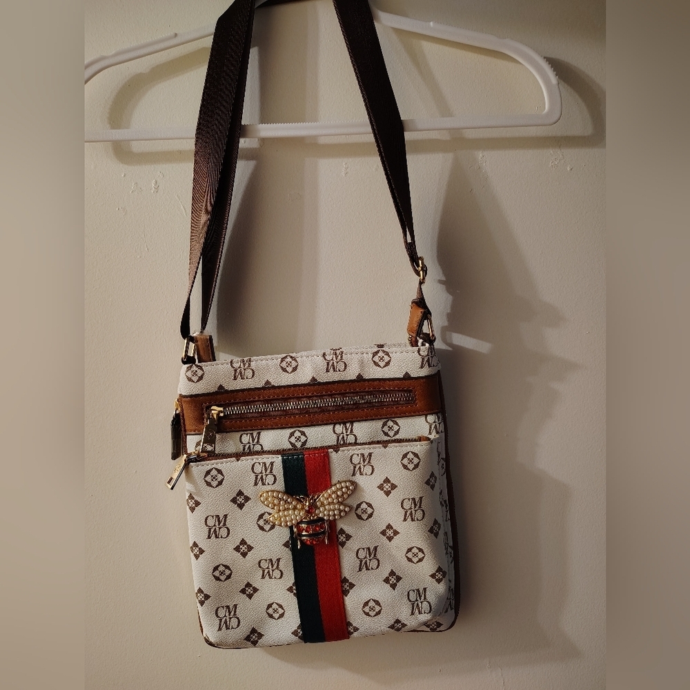 Chic Designer Crossbody Bag with Gold Accents